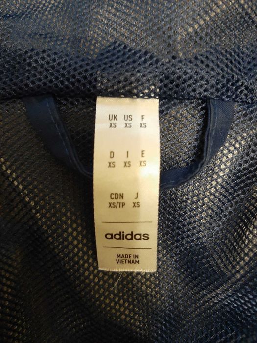 Куртка вітровка Tiro 23 Adidas розмір XS