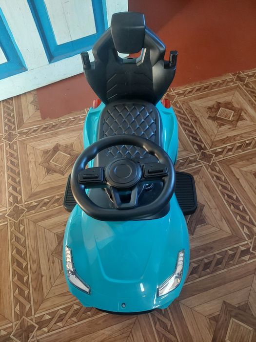 Продам машину из ручкою дитяча