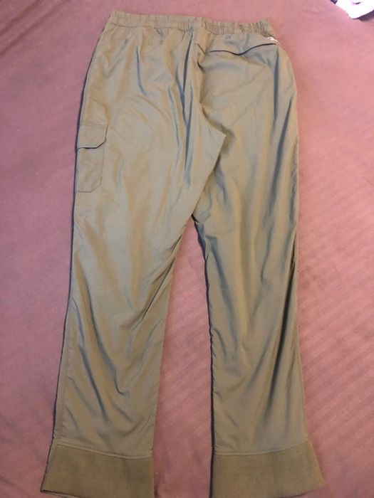 Спортивные Поло ,зеленого цвета ,состояние новых.оригинал .