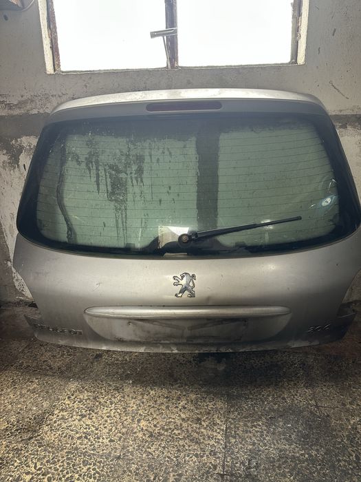 Tampa da mala peugeot 206