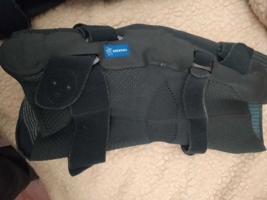 Ортез на колено с боковыми шарнирами Genu Ligaflex Thuasne Франция