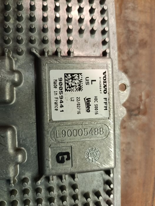 90059441 ( блок керування фарою Volvo)