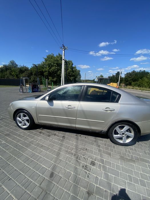 Mazda  3.   2004