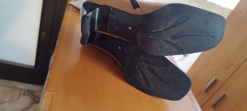 Botas castanhas pele