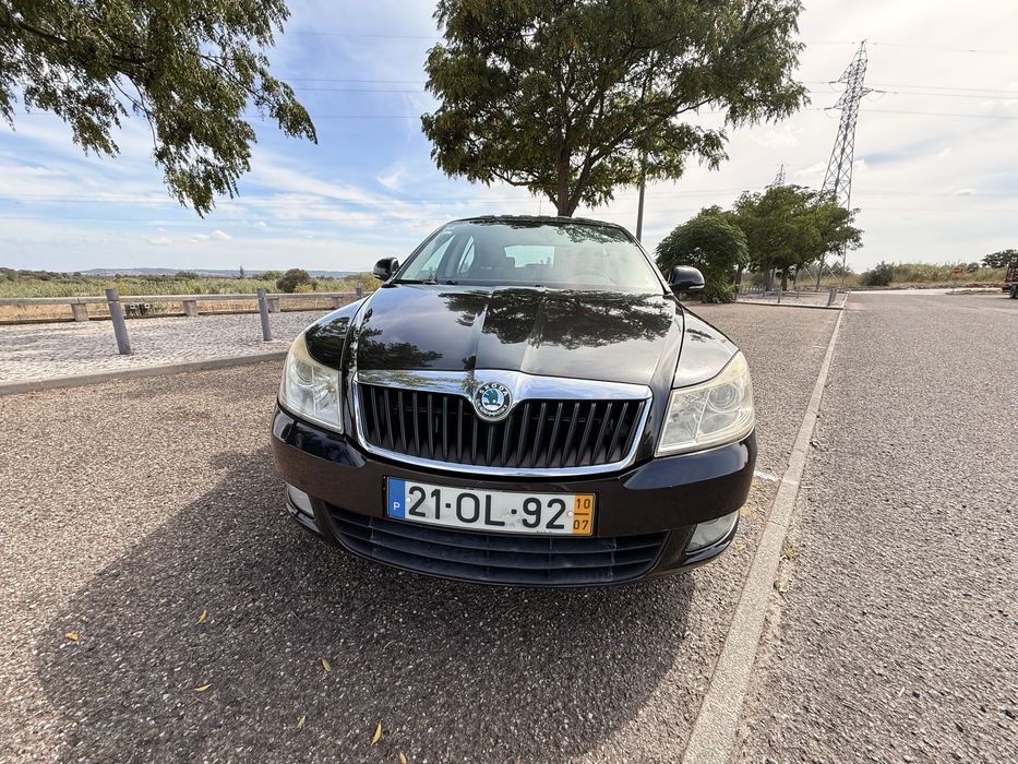Skoda Octavia 1.6 TDI DSG (2010) – Caixa Automática | Teto de Abrir foto 2
