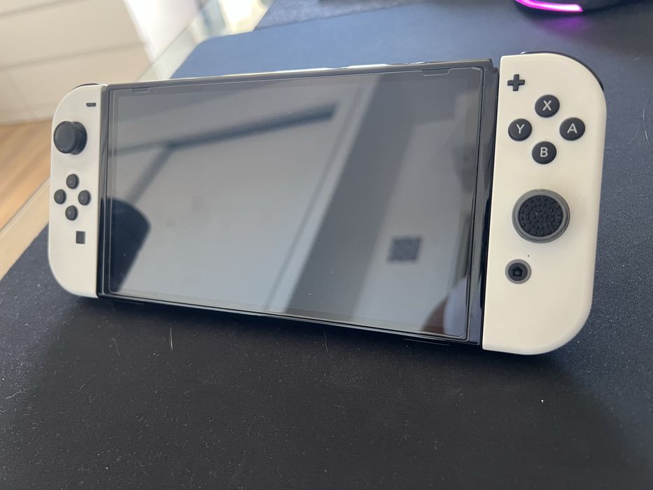 Switch OLED com extras + Wii Sports
