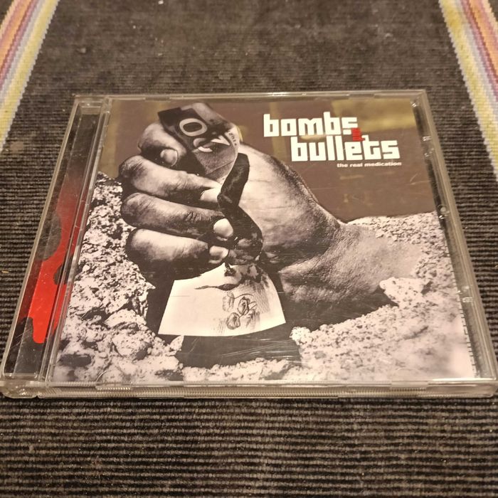 CD Bombs Bullets425129494446745600