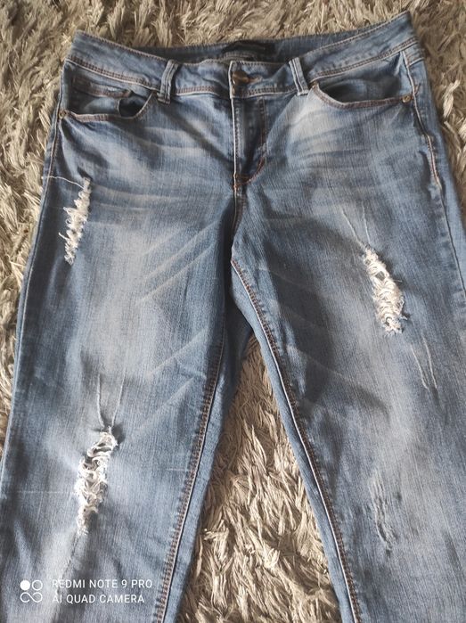 Spodnie dżinsowe " porwane"
