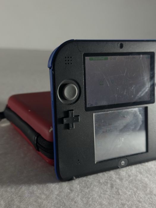 Nintendo 2DS czarno-niebieski + etui – sprawny