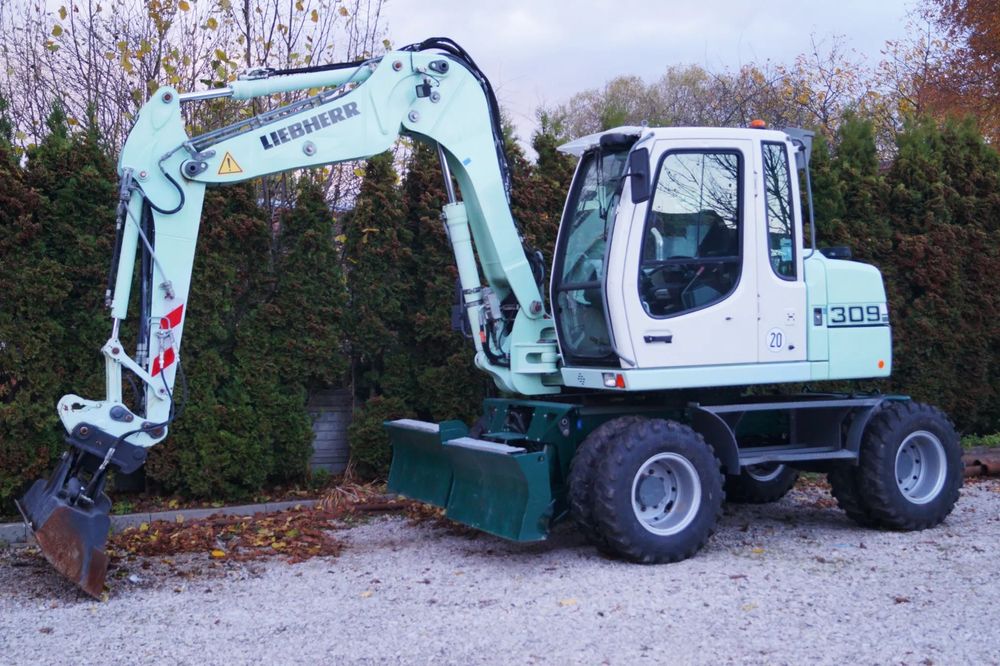 Liebherr 309 LITRONIC KLIMA LAKIER ORGINAŁ NOWE OPONY ( 311 312 TEREX CAT )  12 ton