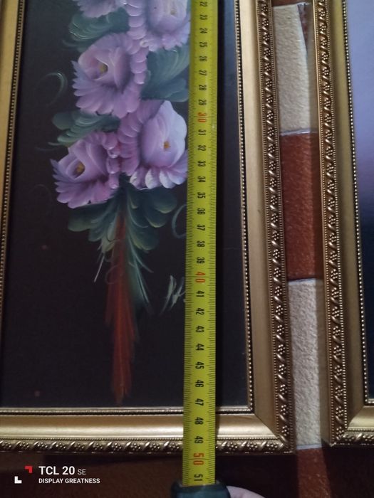 Três quadros com motivos florais
