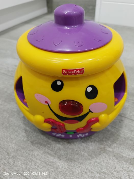 Sprzedam Garnuszek na klocuszek FISHER PRICE.