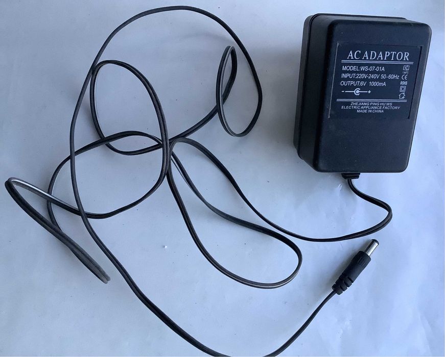 Блок питания в розетку AC ADAPTOR WS-07-01A 6V 1000mA