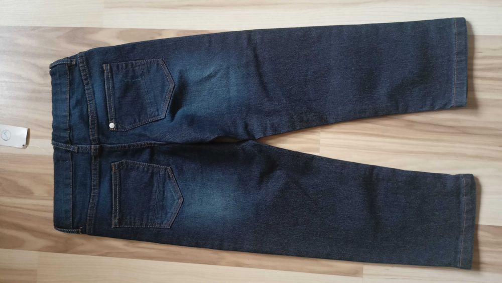 nowe z metką spodnie ciemny jeans 110/116