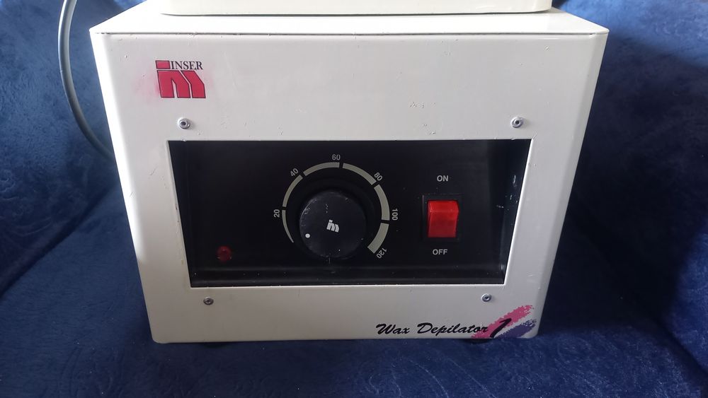 Panela de cera quente.