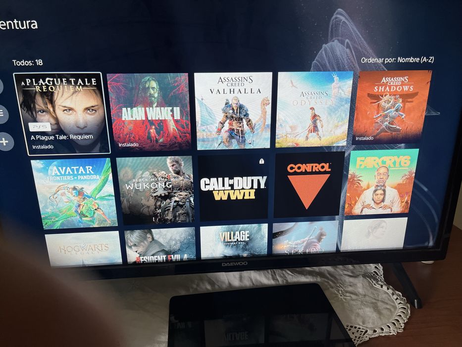 Ps5 dois comandos conta com varios jogos …… tem fifa 26