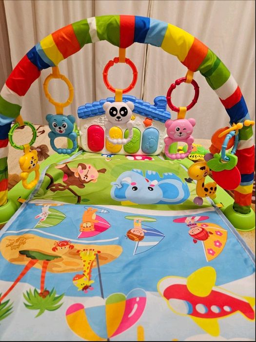 Розвиваючи килимок для немовлят