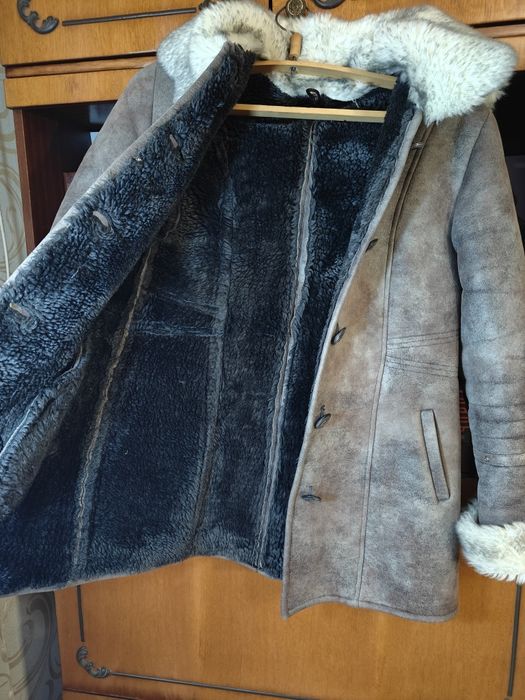 Штучна дублянка сірого кольору