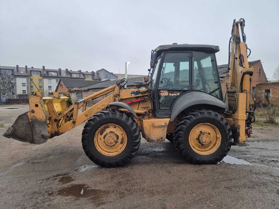 Koparko-ładowarka Case 695 Super R powershift opons 80% nie Jcb brutto