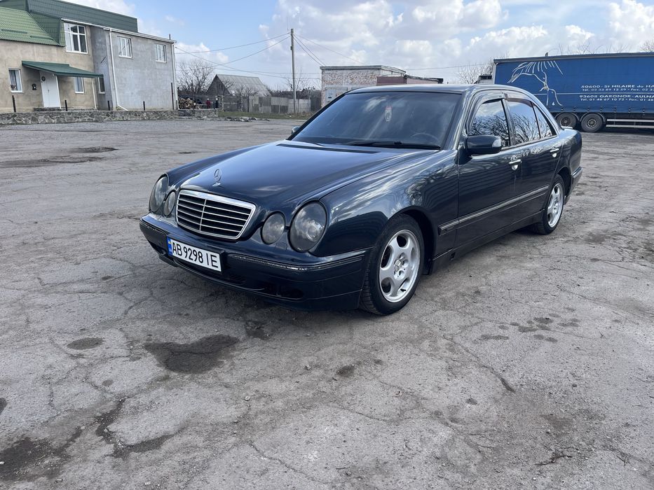 Мерседес Бенз 210