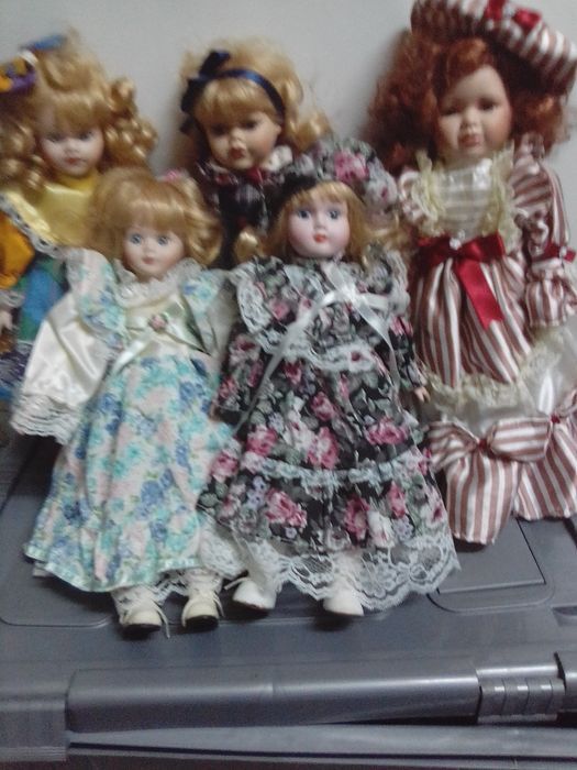 Bonecas de porcelana estão novas  como se vê nas fotos