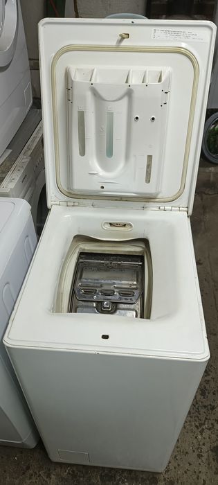 Пральна машина Electrolux вертикальне завантаження