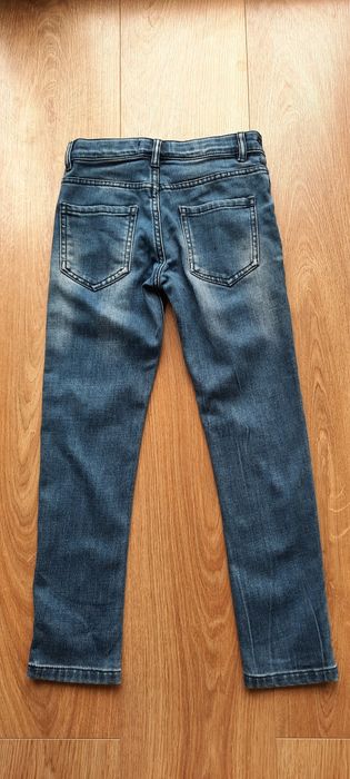 Sprzedam jeansowe spodnie z Next r.122