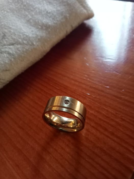 Aliança em aço com brilhante e segmento