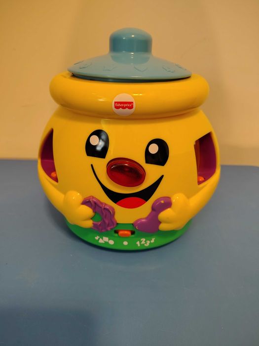 Garnuszek Fisher Price
