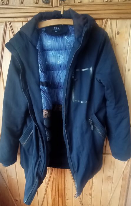 Пуховик мужской синего цвета