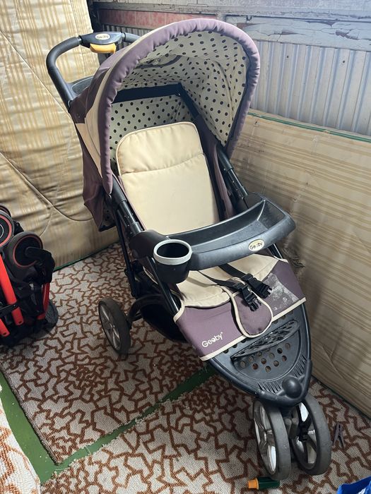 Детская прогулочная коляска