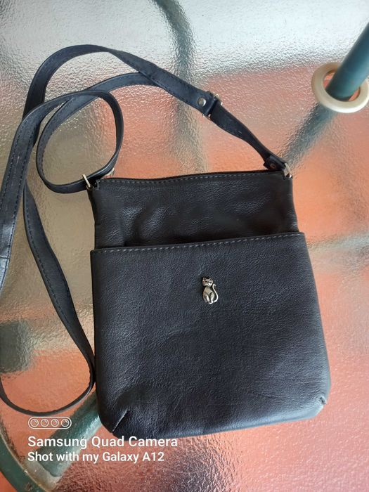 Mala Nova, Preta de Pele com Gatinho na Frente