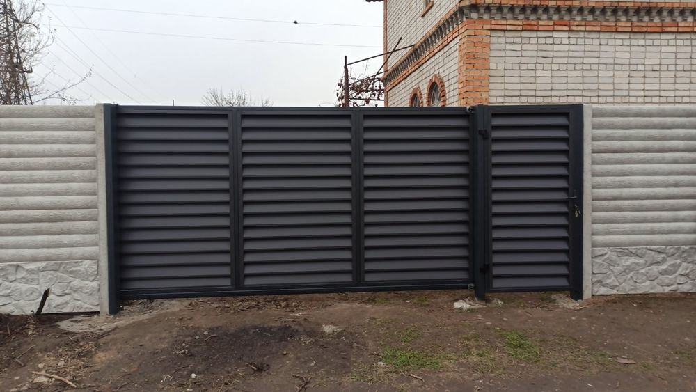 Заборы, ворота откатные, распашные, калитки,навесы.