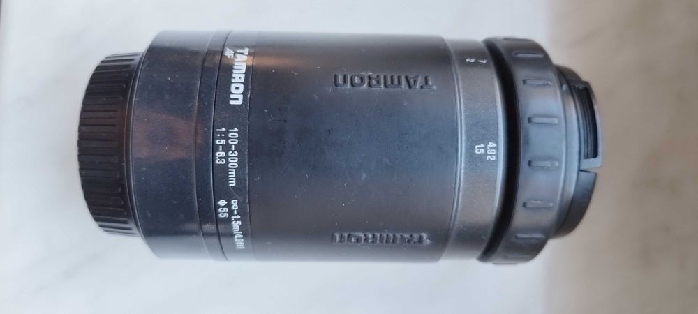 "Obiektyw Tamron 100-300 mm do Canona – używany, sprawny, okazja!"
