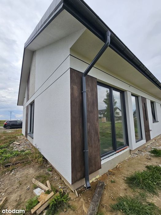 NOWOCZESNY DOM - 91 m² energooszczędnego komfortu bez zbędnych metrów.