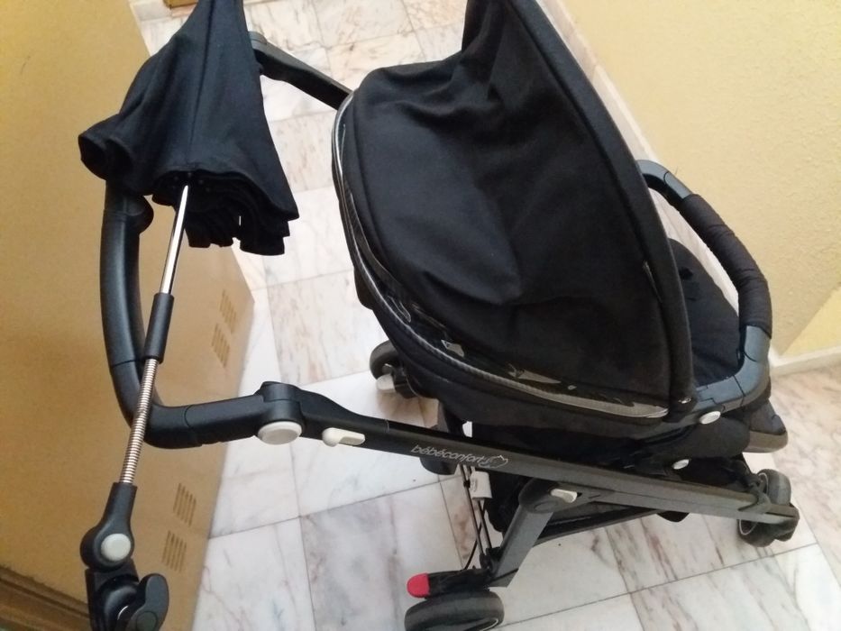 Carrinho bebé bebeconfort bem estimado com chapéu protecção solar