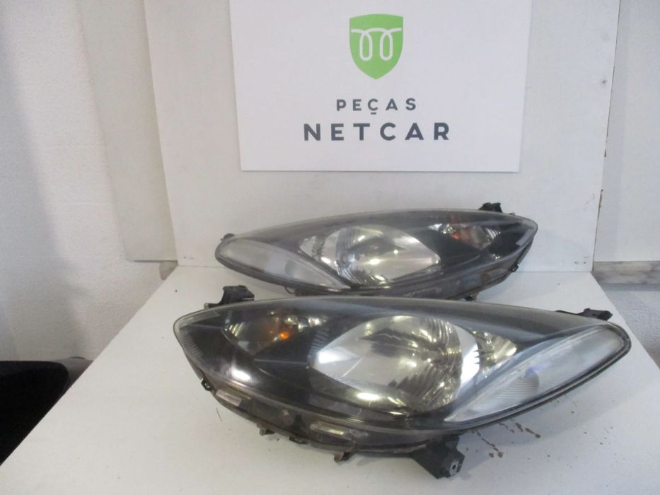 Farol óptica Mazda 2 2007