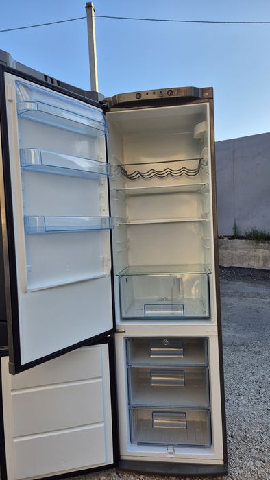 Продам бу двокамерний холодильник Electrolux висота 2 м , робочий