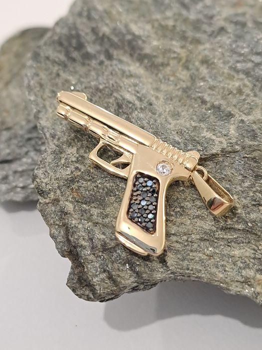 Złota zawieszka Pistolet Pr.585 Nowa 1.6 x 2.5 cm