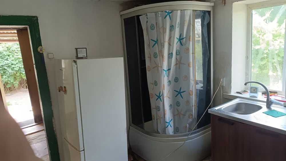 Продам будинок на березі озера в с.Калинівка. Газ,бойлер,сад