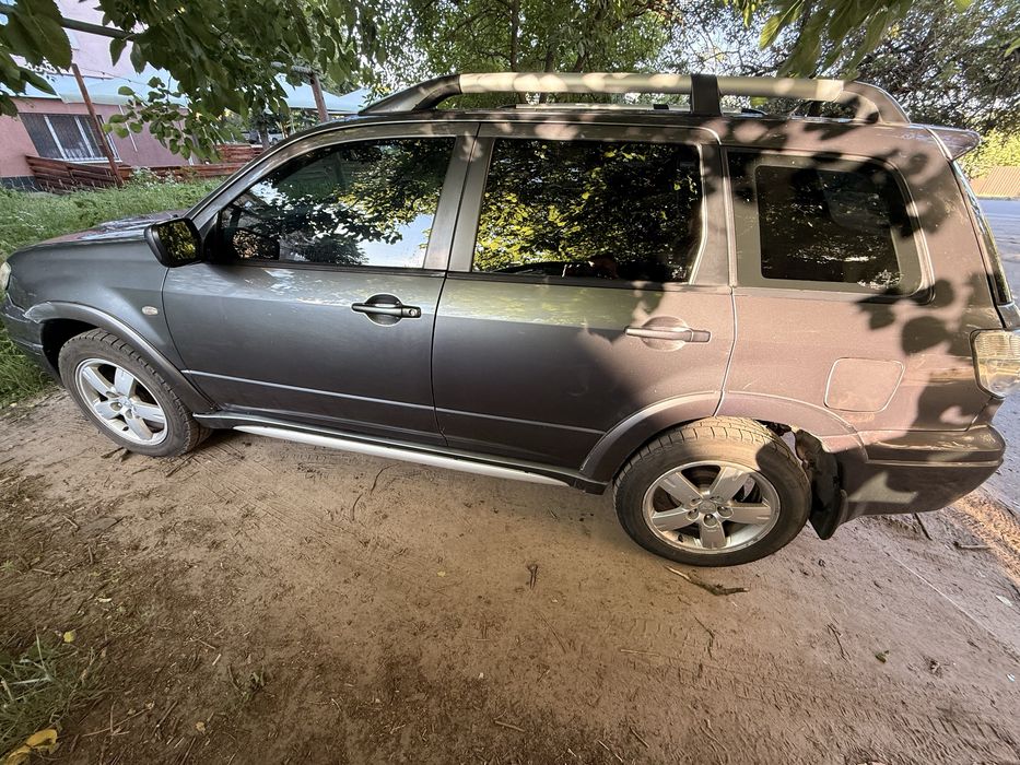 Mitsubishi Outlander 2008 VIN JMBXNCU2W8U001702 фото оголошення 2 з 7