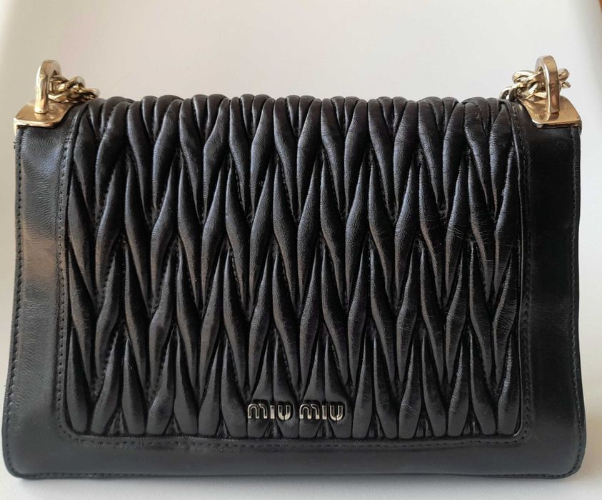 Mala Miu Miu muito bom