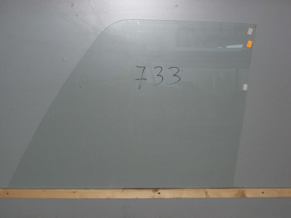szyba ładowarka teleskopowa CAT  TH220B, - drzwi górna  nr 733