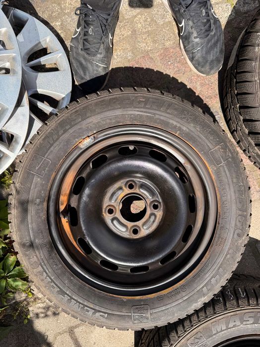 Koła zimowe 14 Ford Fiesta mk5 mk6 Focus I + 185/60R14 Semperit
