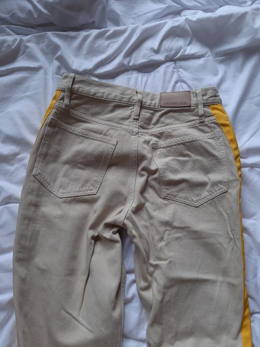 Jeansy beżowe Calvin Klein