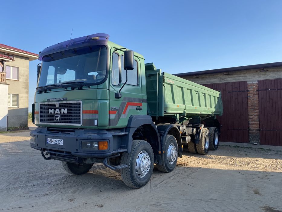 Usługi koparką gąsienicową-kołową , wywrotka MAN 8x6,laweta