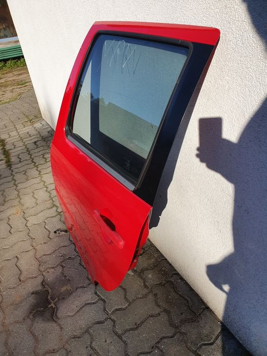 Daihatsu YRV M2 drzwi lewy tył tylne lewe kompletne