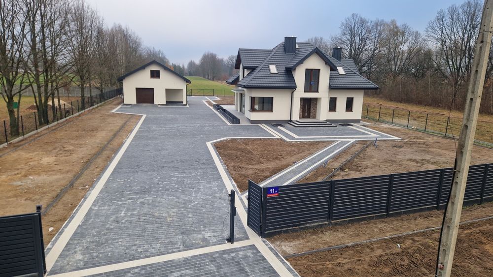 Uslugi Brukarskie, Układanie kostki brukowej