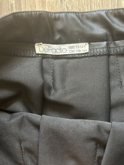 НОВІ Шкірозамінні шорти та спідниця