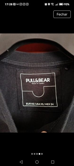 T-shirt preta, da Pull & Bear, da tam XS .
